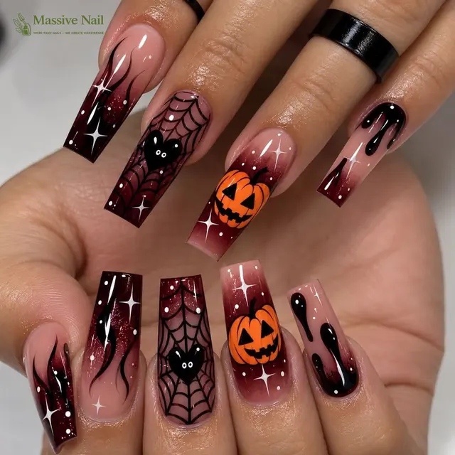 Spider web and pumpkin nail art